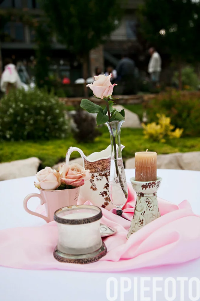 Image of pink vintage vases and roses