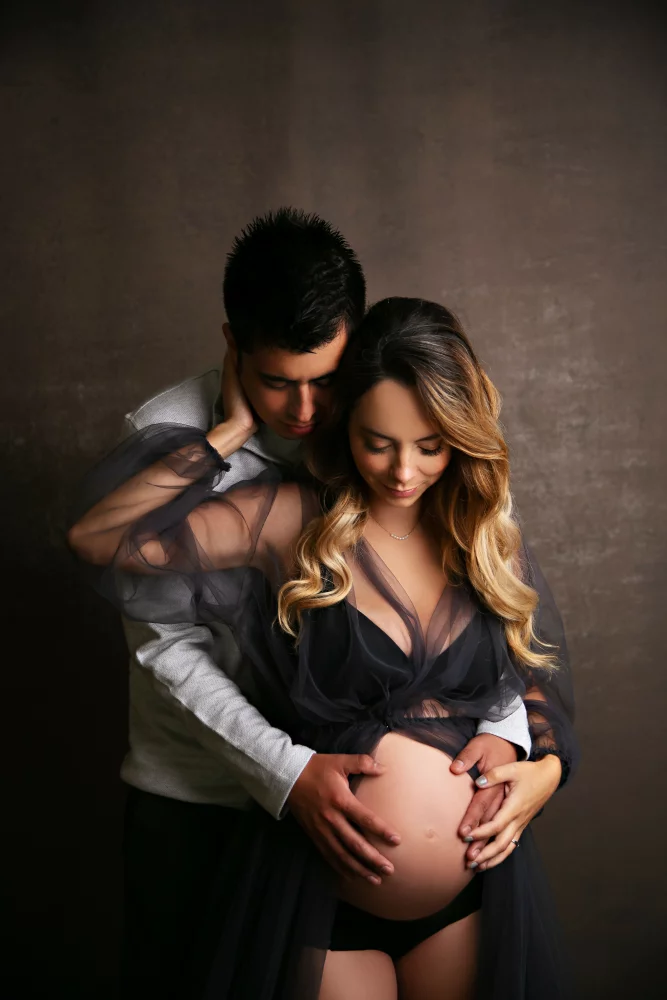 Image of studio maternity photos with husband