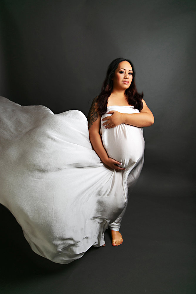 maternity pregnant woman posing for photos