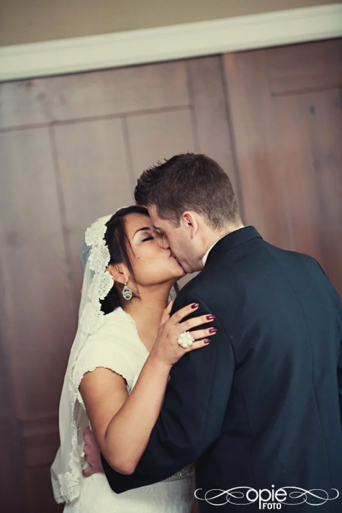 Image of first kiss as bride and groom