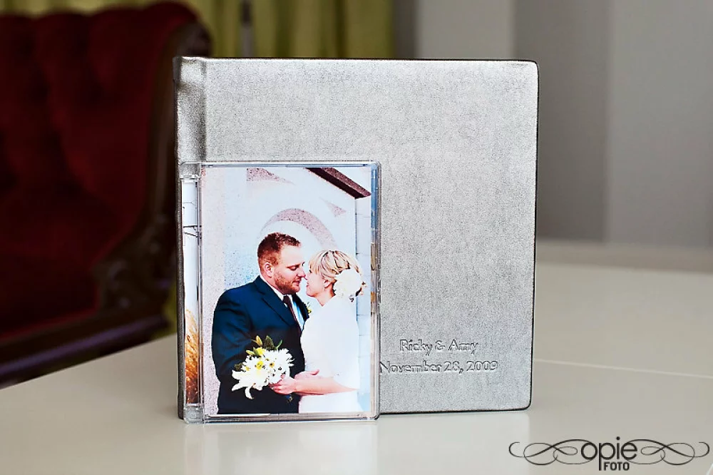 Image of leather wedding album and disc