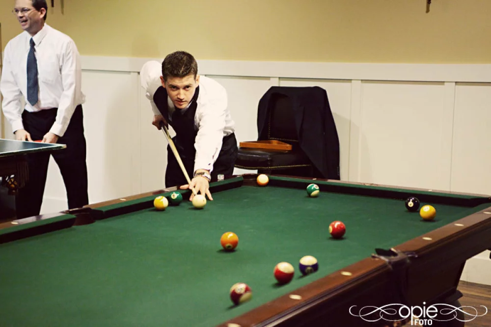 Image of groom getting ready